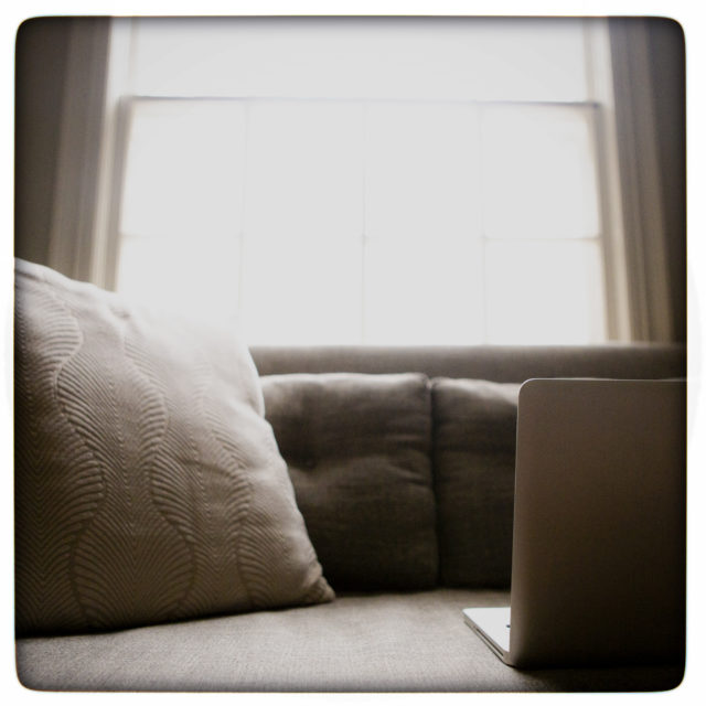 laptop sitting on a couch